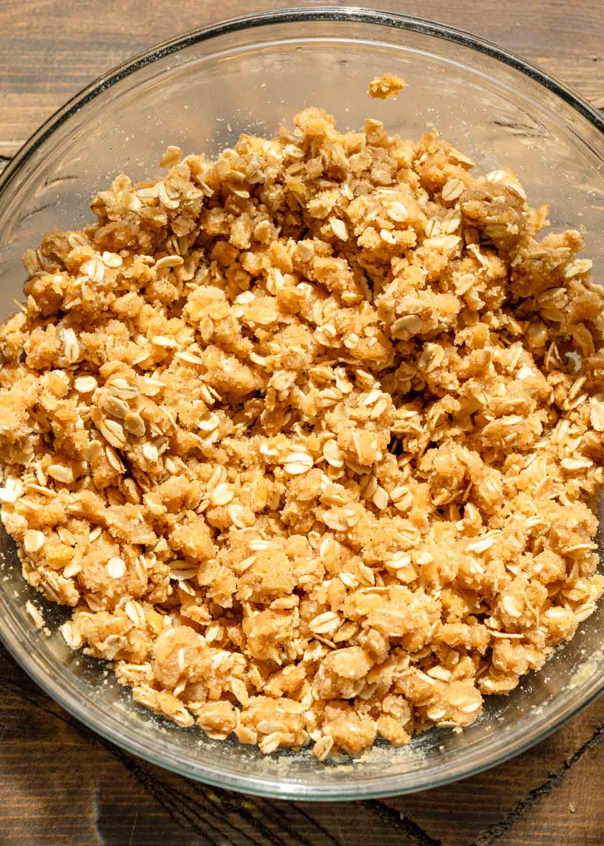 crumbly oat mixture in a bowl ready for dessert bars