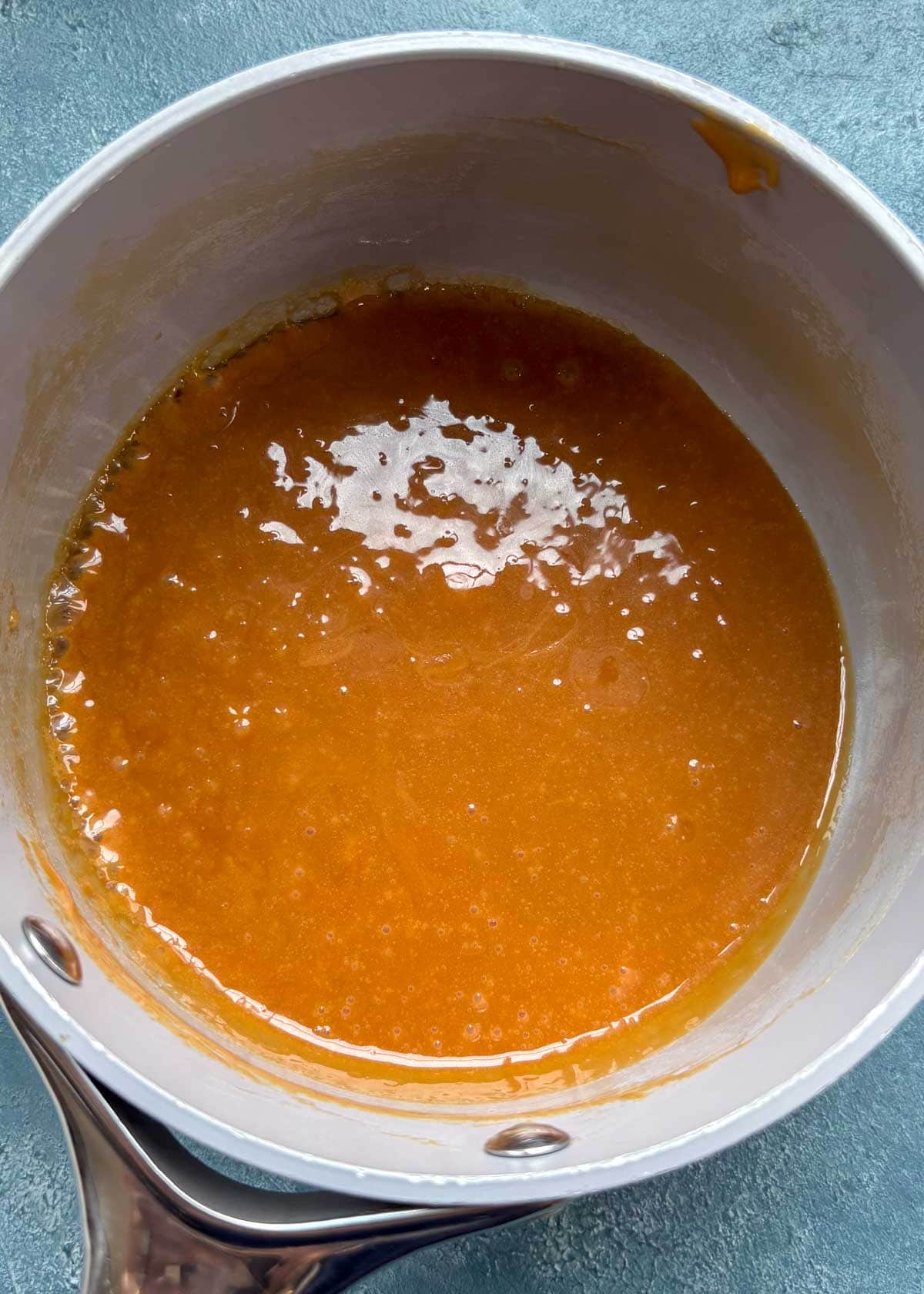 caramel thinned out with a little milk in a saucepan