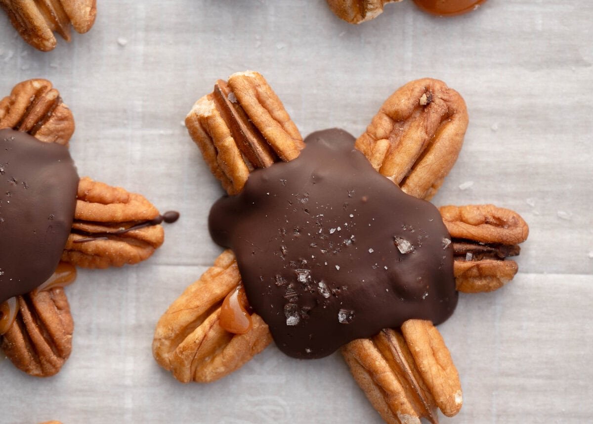 melted chocolate and sea salt over pecan turtles