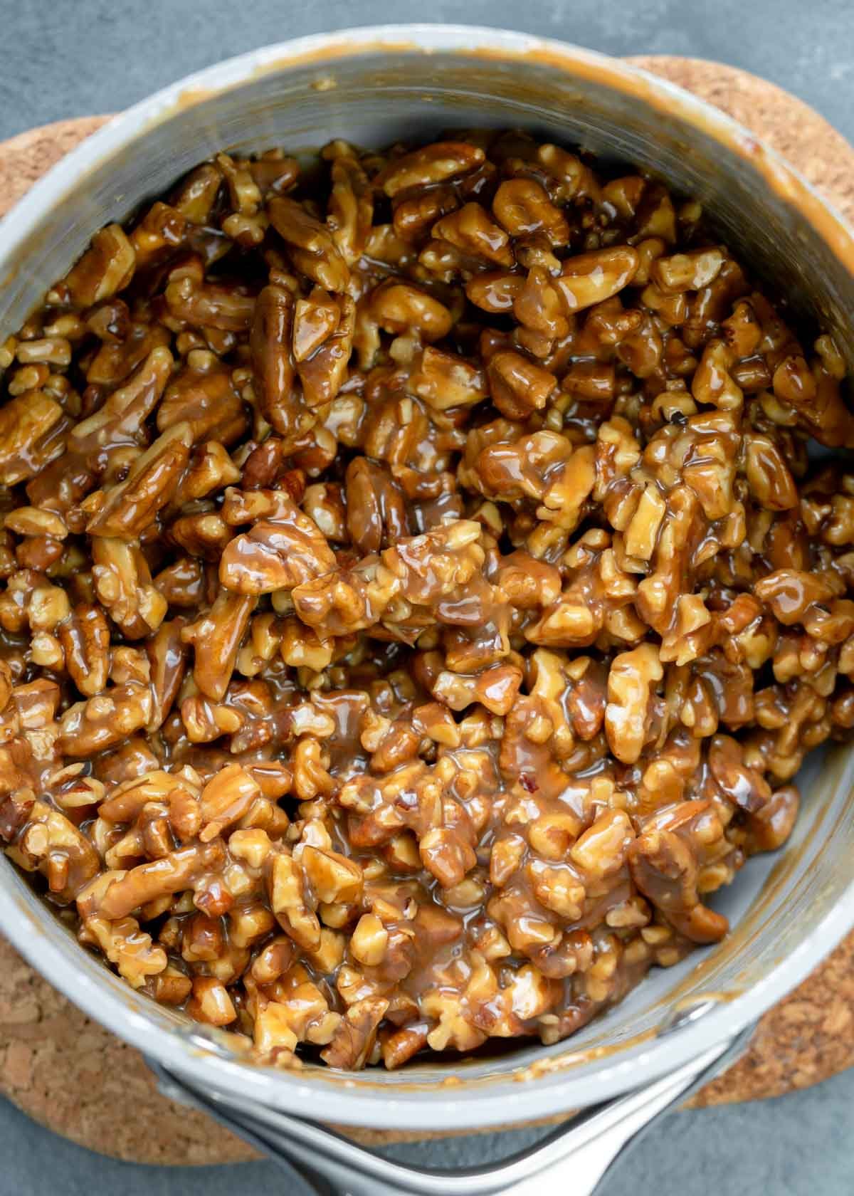 chopped nuts mixed into a caramel mixture