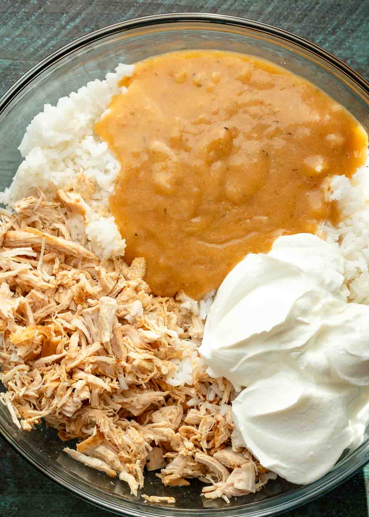 homemade cream of chicken soup added with rice, chicken, and sour cream