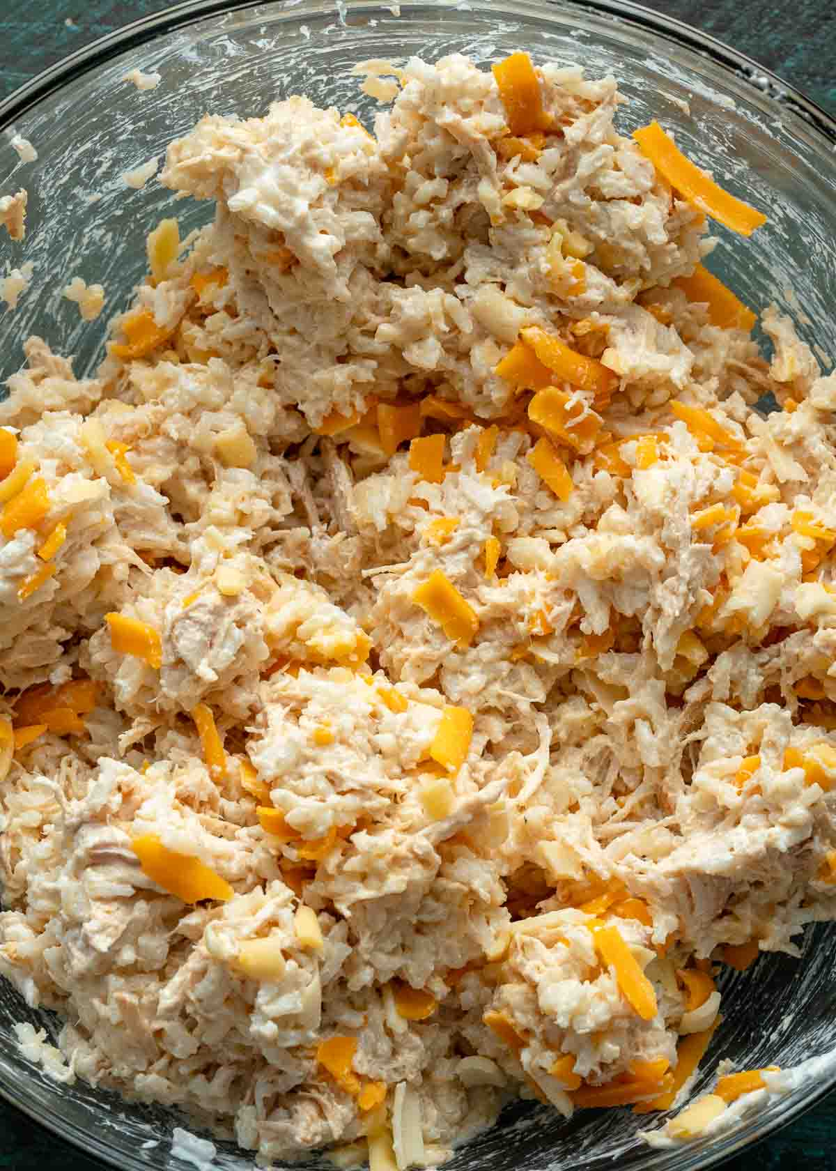 shredded cheese mixed into the chicken rice mixture
