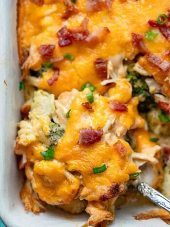 overhead shot showing a serving spoon scooping up a serving of crack chicken casserole