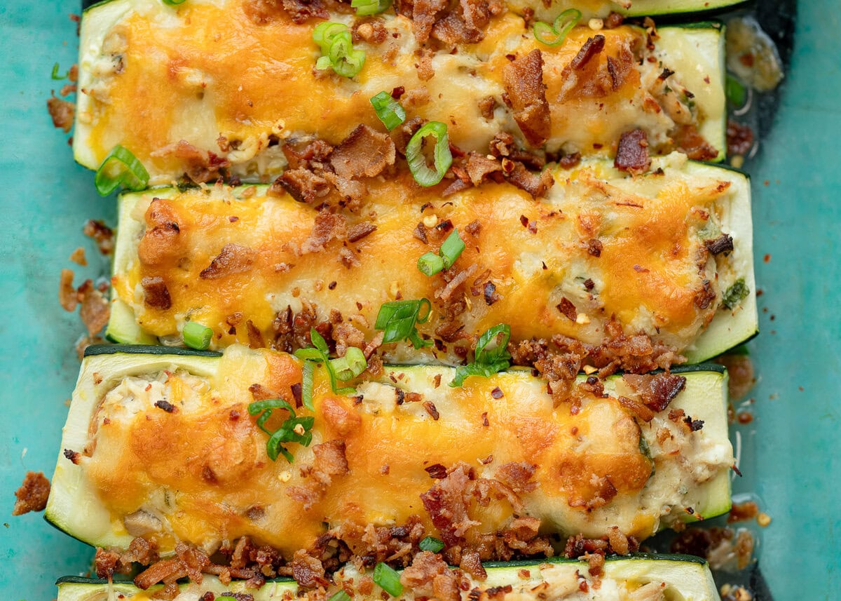 closeup of cheesy chicken bacon ranch zucchini boats