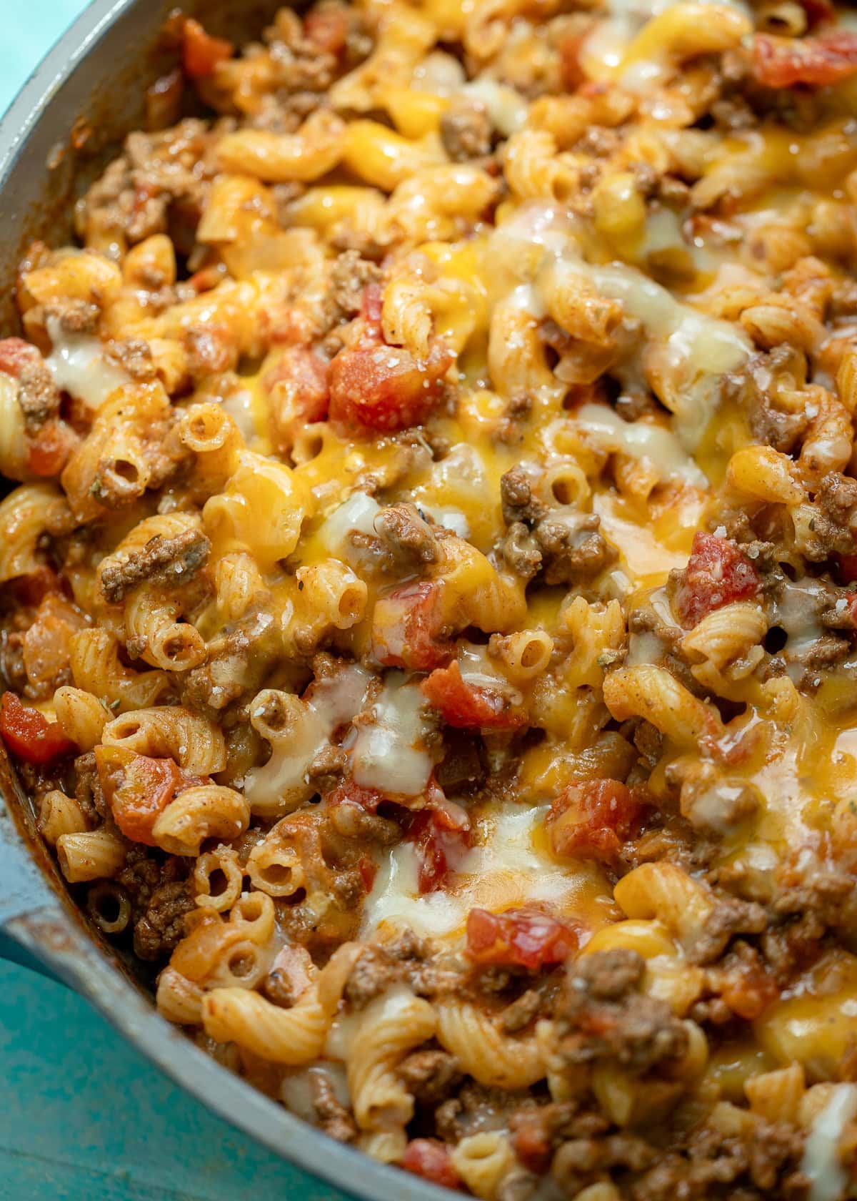 super easy chili mac and cheese recipe in a skillet