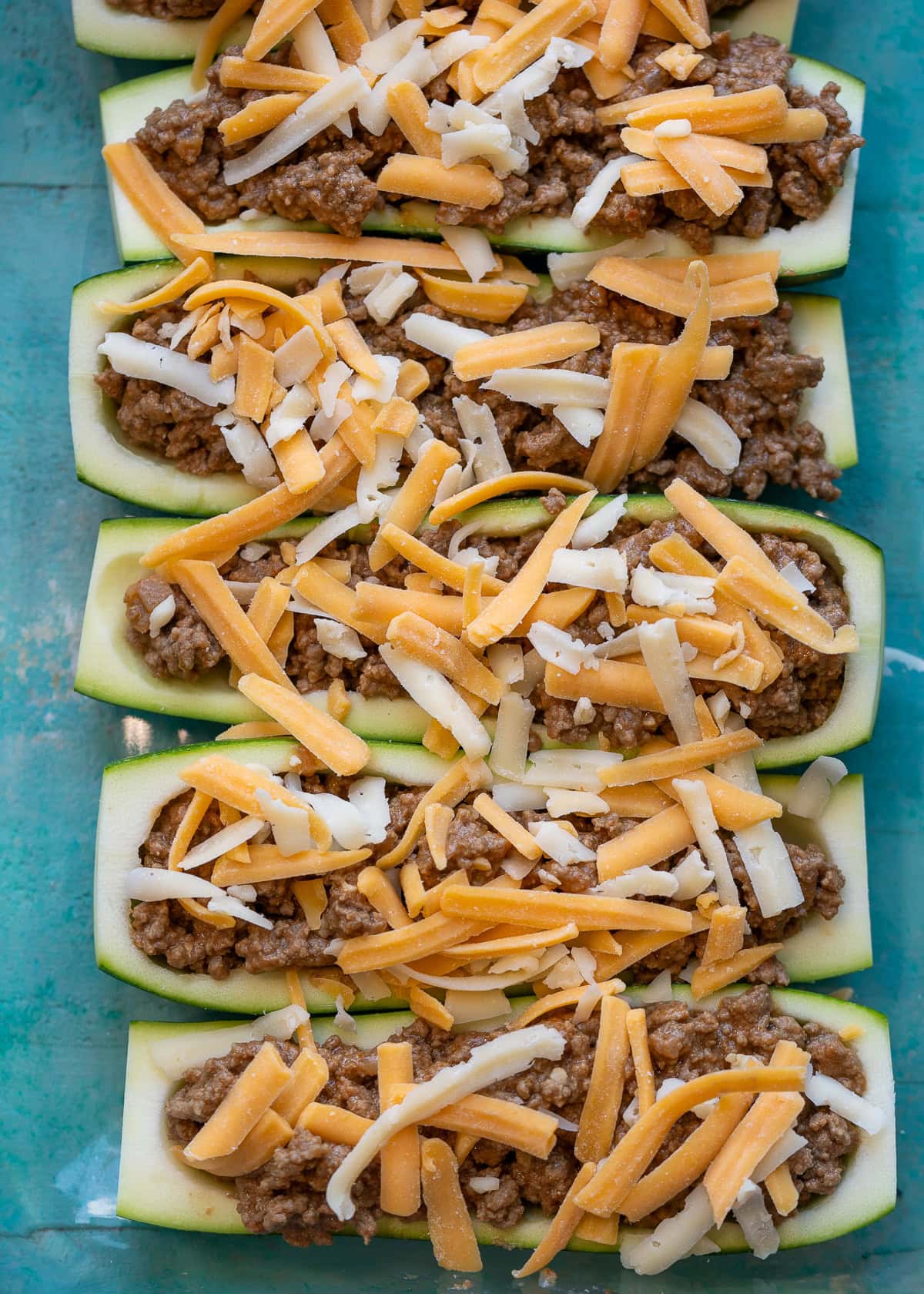zucchini boats with ground beef topped with cheese