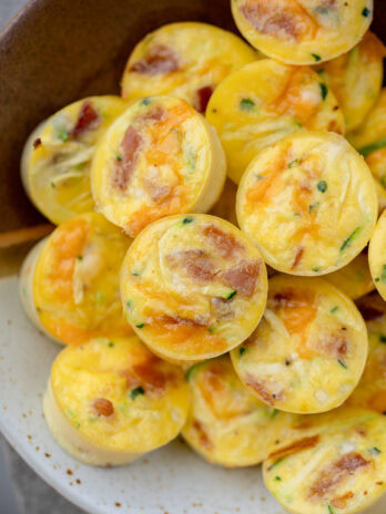 a platter full of zucchini egg bites with cottage cheese for an easy make ahead breakfast recipe