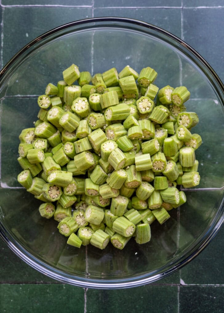 Sliced okra in a glass bowl