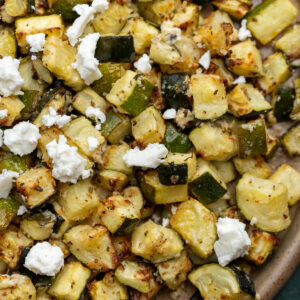 a closeup shot of air fryer zucchini with feta