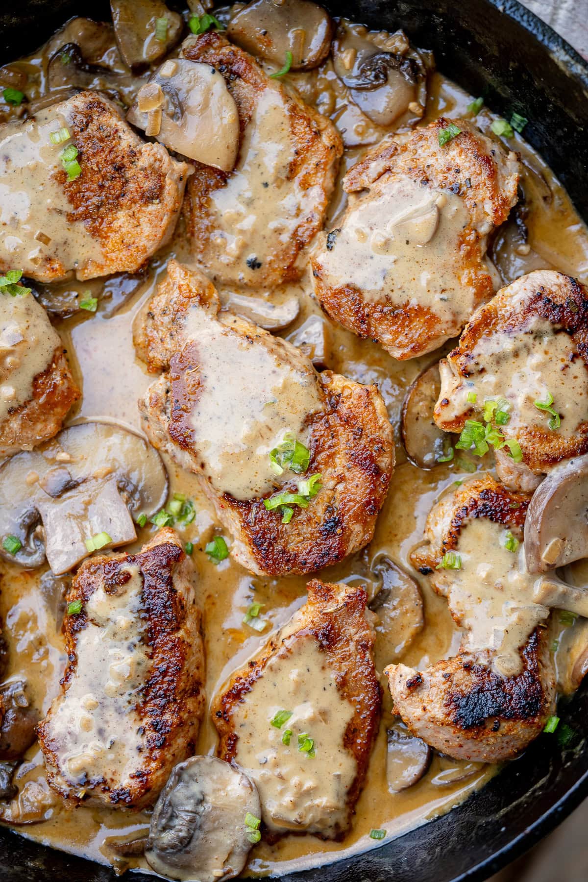 juicy seared pork medallions covered in a creamy mushroom gravy