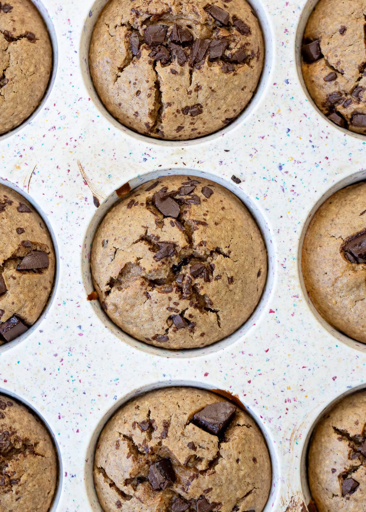 perfectly cooked banana oatmeal muffins in a silicone muffin pan