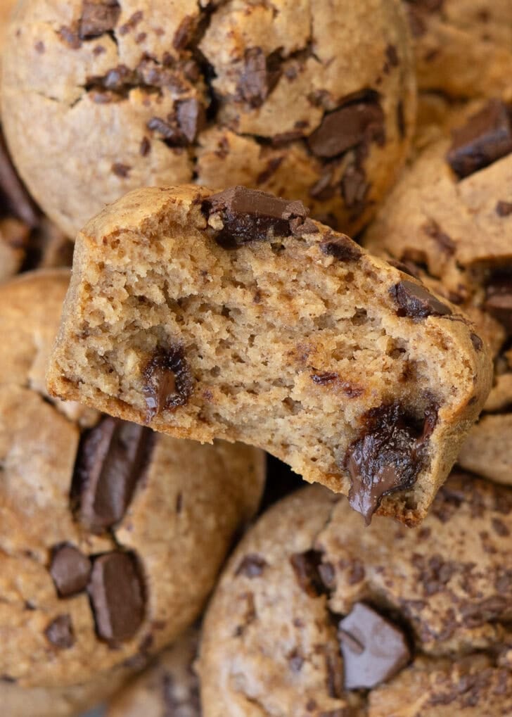 closeup image showing a muffin cut in half with fluffy, airy insides