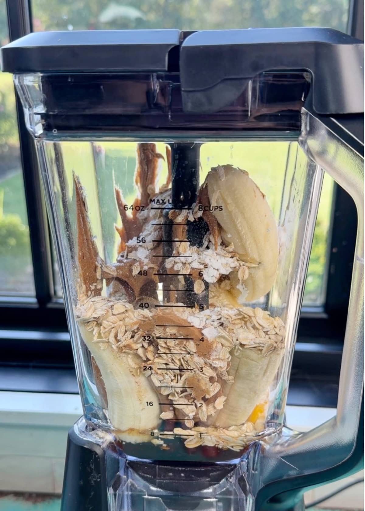 bananas, oats, almond butter, egg, baking powder, salt, and cinnamon in a blender