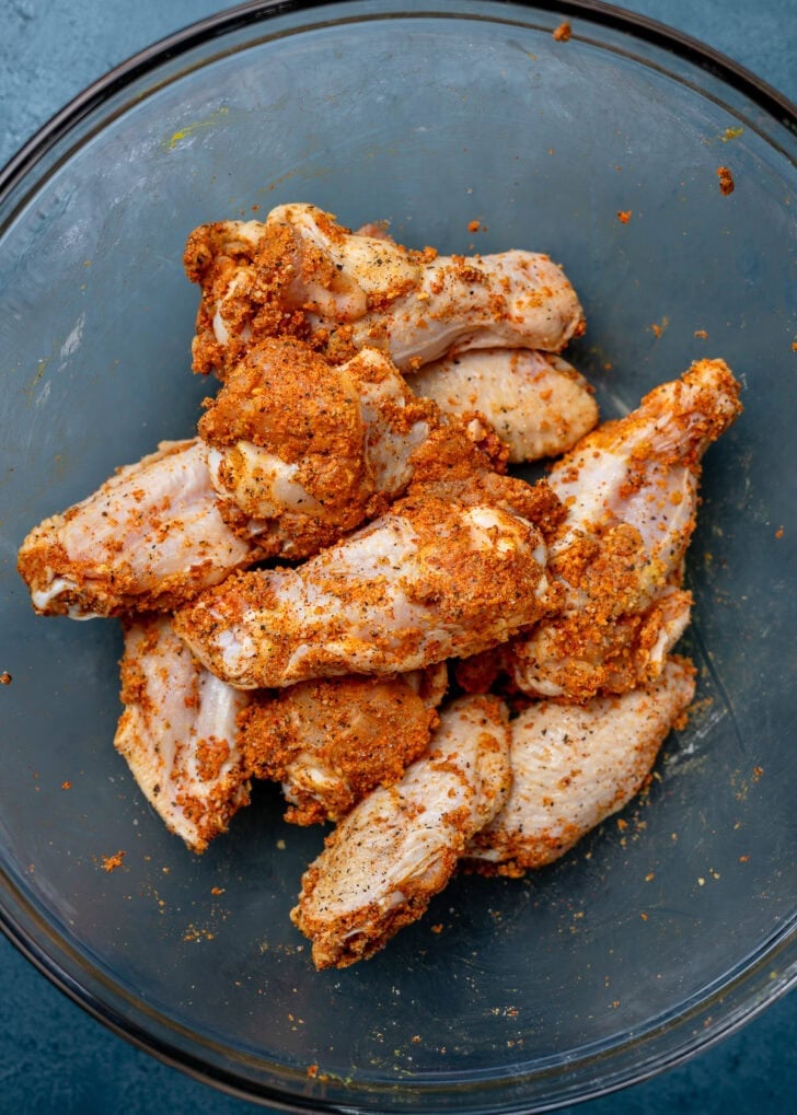wings tossed in seasonings and baking powder