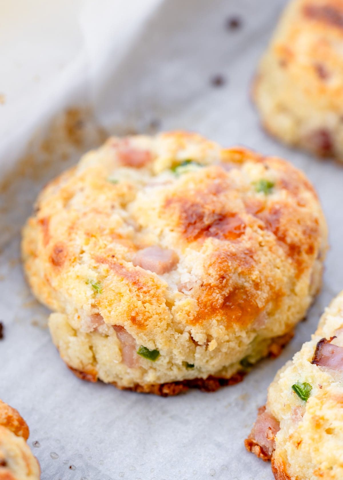 golden brown gluten free biscuits on a baking sheet