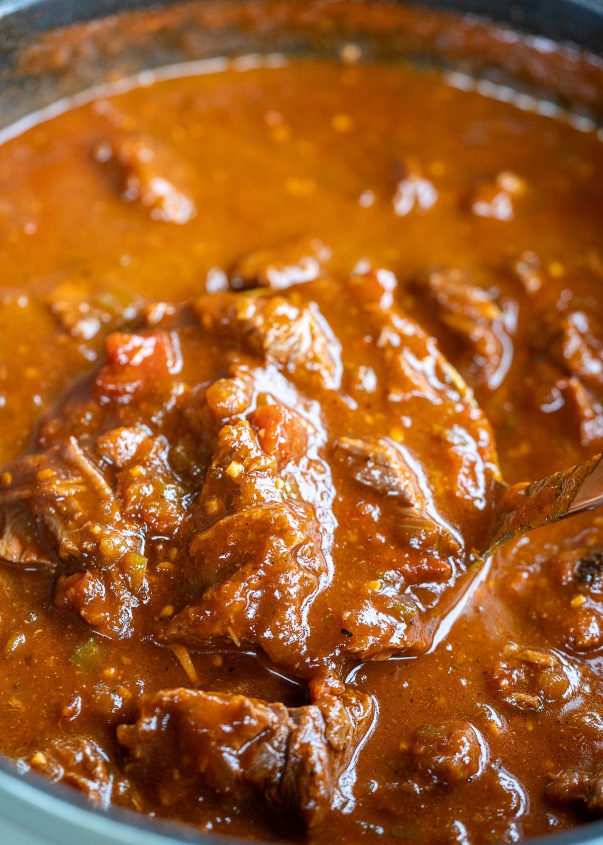 a ladle of chuck roast chili con carne